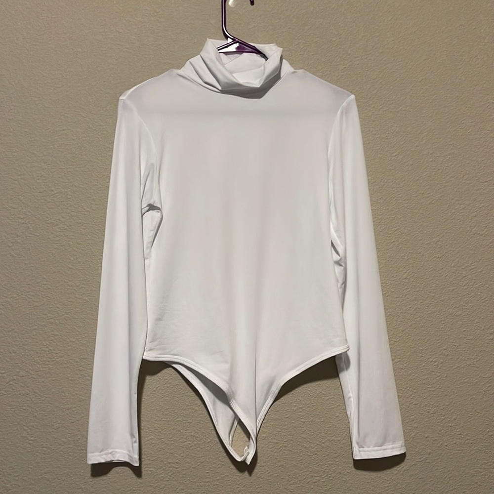 White turtleneck body suit, never worn